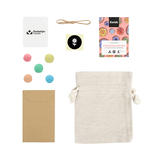 Zaadbommetjes in linnenzakje - Inhoudsfoto