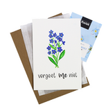 Bloemenzaden met kaart 'Vergeet me niet' verpakt in pergamijn zakje
