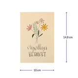 Bloemenzaden met kaart 'Vrijwilliger bedankt' verpakt in pergamijn zakje