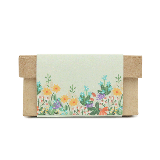 Zaadbommetjes in papier mach&eacute; doosje - Bedankt - Zijkant wikkel